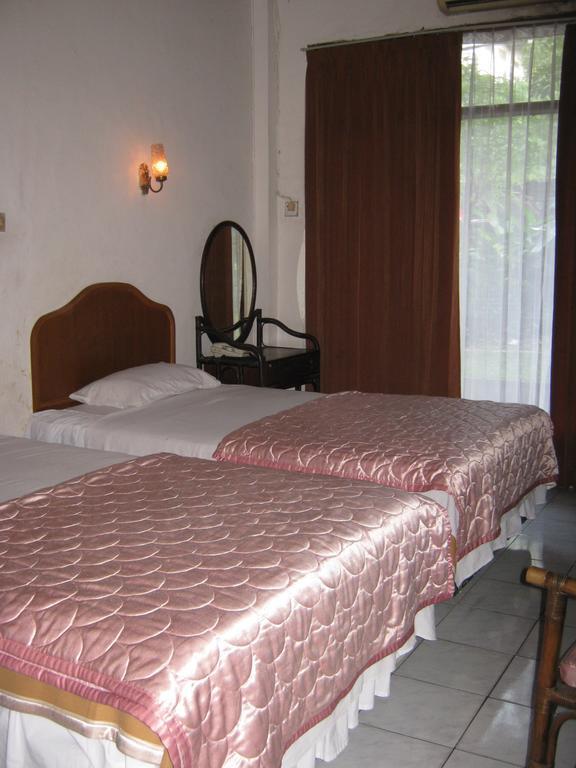 Le Paradis Hotel ปาเลมบัง ห้อง รูปภาพ